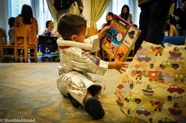 Evan couldn't resist temptation and started opening some presents 