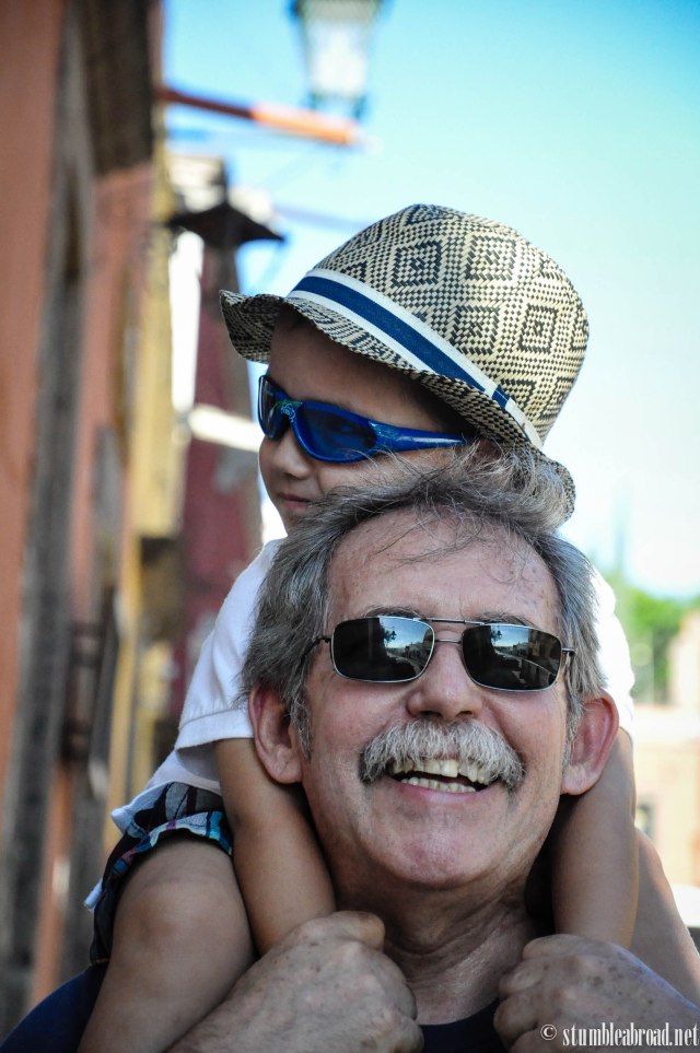 Enjoyed riding on abuelo's shoulders.
