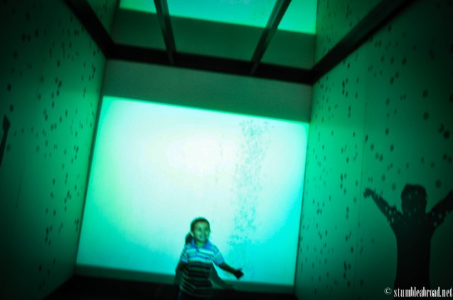 Evan playing with his own shadow