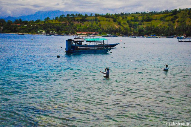 People were fishing right by the pier 